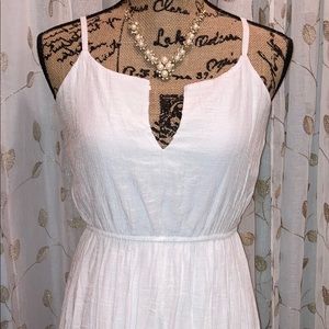 Size S, in Excellent Condition, too long for me.